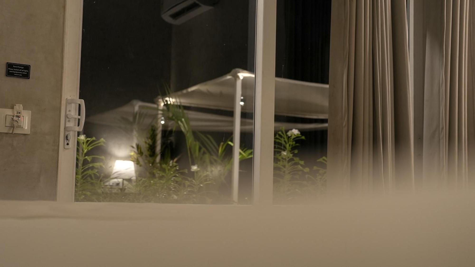 Whiteflower Resort Morjim Bagian luar foto